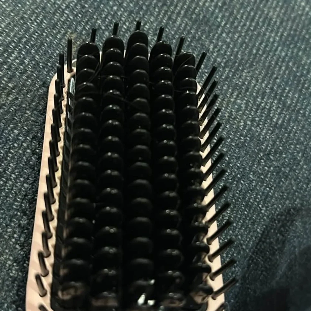 Lange brush hair straightener